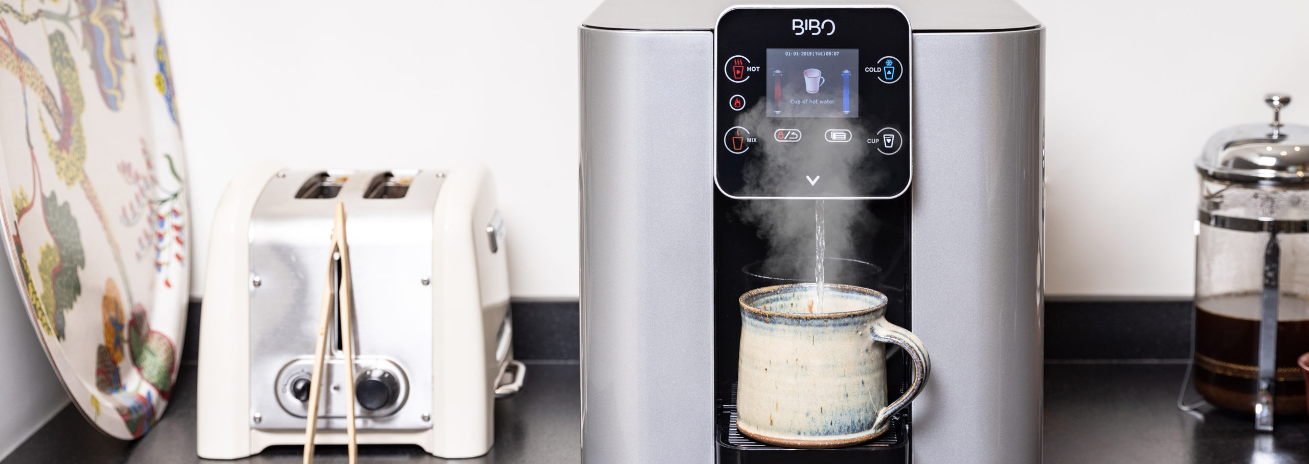 Instant hot water from a BIBO water dispenser