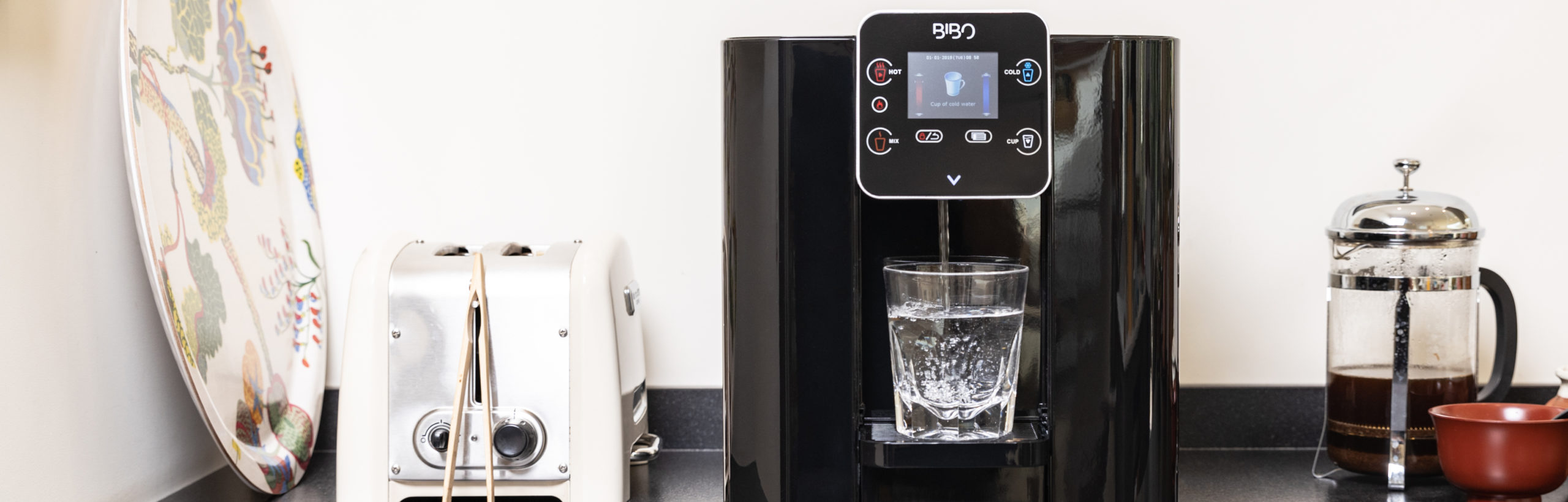 Black BIBO filtered water dispenser in use